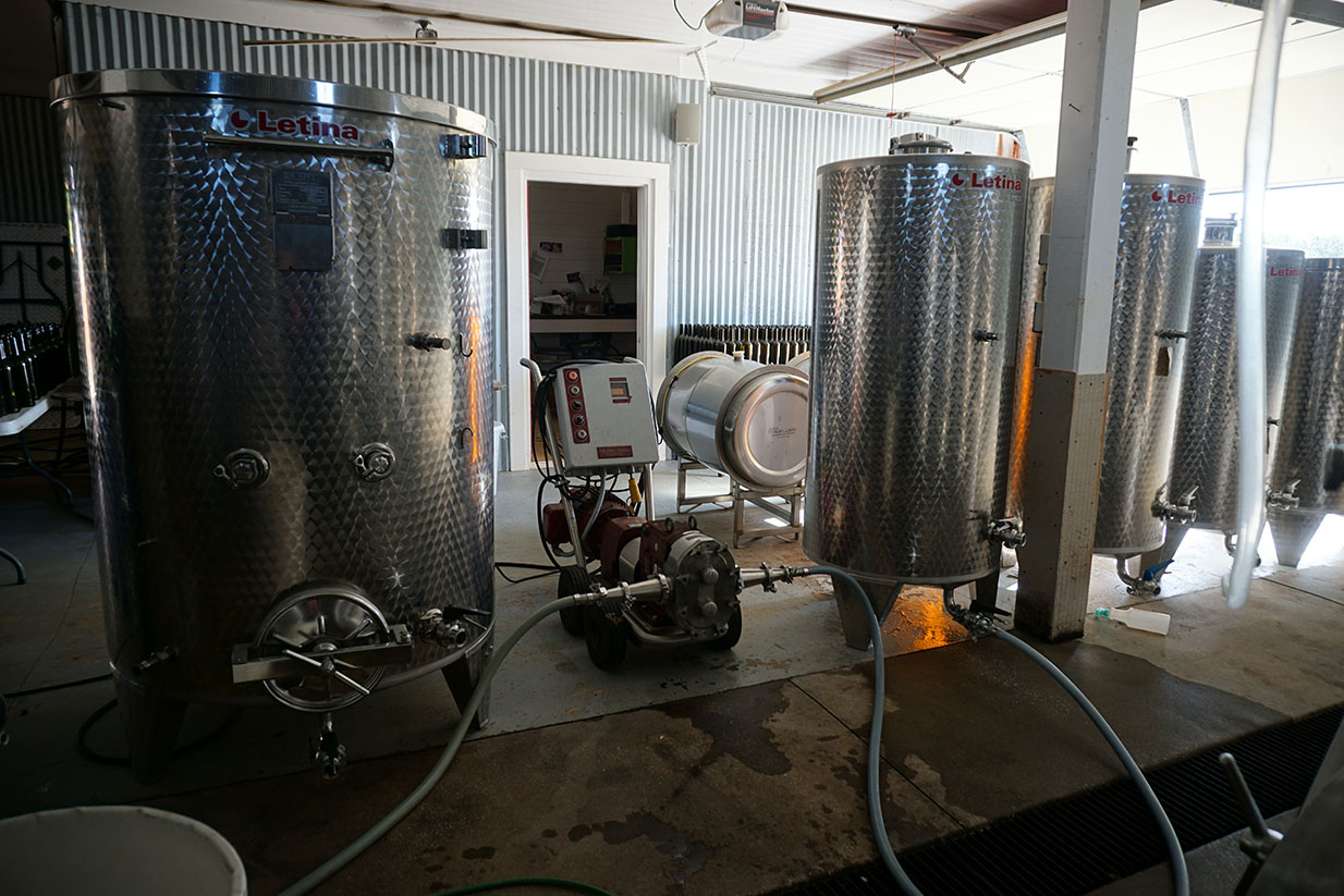 Steel fermentation tanks.
